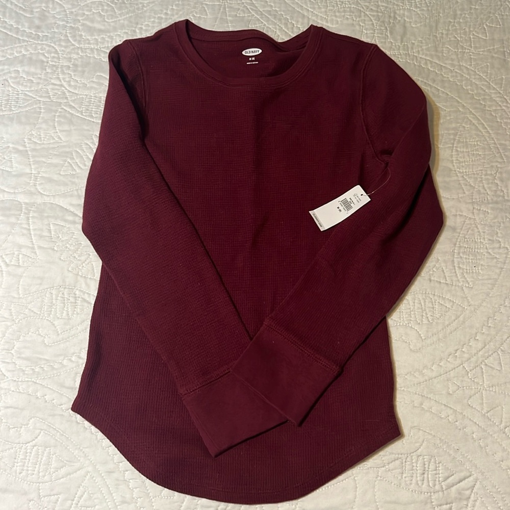 Brand new girls long sleeve shirt. Size medium